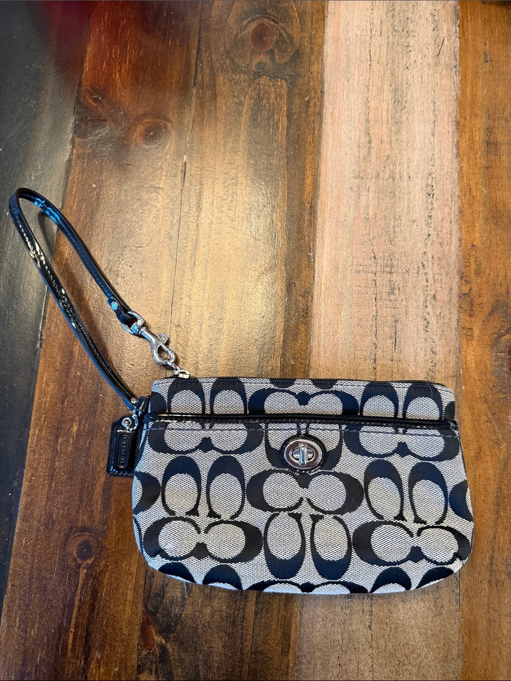 Coach Black & white Signature Canvas Wristlet with Turnlock. NWOT